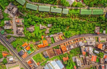 Looking Down At Neighborhood Of Banos De Agua Santa, Latin American City, Tungurahua Province, South America