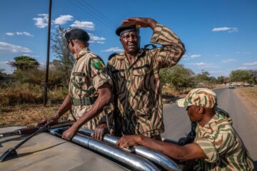 The Human Wildlife Conflict rapid response team on a jeep